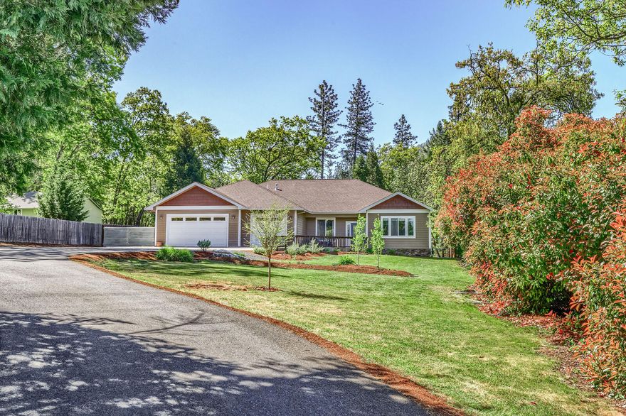 Stunning single level 2174 sf home built in 2007 with attached 3-car garage on just under an acre less than five minutes to town & hospital. Vaulted, light & bright great room floor plan w/ gas fireplace, and gorgeous views of rolling lawns & surrounding mountains. Huge center island kitchen with granite slab counters, countless cabinets, newer stainless-steel appliances including 4-burner gas range with griddle. Split bedroom floor plan. Minimum 9-foot ceiling plate, coffered ceiling in master. Elegant European soaking tub and large step-in shower in master bath, tile floors, quartz dual sink counter and water closet. Enjoy the private, fenced backyard from your covered patio. Huge shop/shed with tons of outlets. Formal dining room w/ hardwood floors. Mud sink in laundry.  Gated w/circular paved driveway and 40+ foot RV parking. Central vacuum, CAT 6 wiring for superior internet speed. This home is move-in ready. And yes, somebody pinch me, annual property taxes under $1,700.