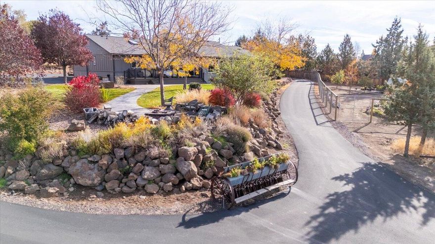 Enjoy panoramic Cascade Mountain views from this beautifully updated single-level home in Terrebonne. Featuring real hickory wood floors, knotty-pine cabinetry, granite counters, and an oversized island; the kitchen shines with skylights and newer stainless-steel appliances. The spacious primary suite includes a walk-in closet and a stone-tile shower. A second primary w/full bath and Murphy bed offers versatile space-ideal for multi-generational living.

Outside, enjoy Trex decking with a pergola and roll-up shades, a cozy fire pit, and a gated garden with fruit trees and a soothing water feature surrounded by six-foot fencing. Addtl highlights include two insulated garages, a 960 sqft shop, carport, full RV hookups, new HVAC, furnace, and roof (2021).