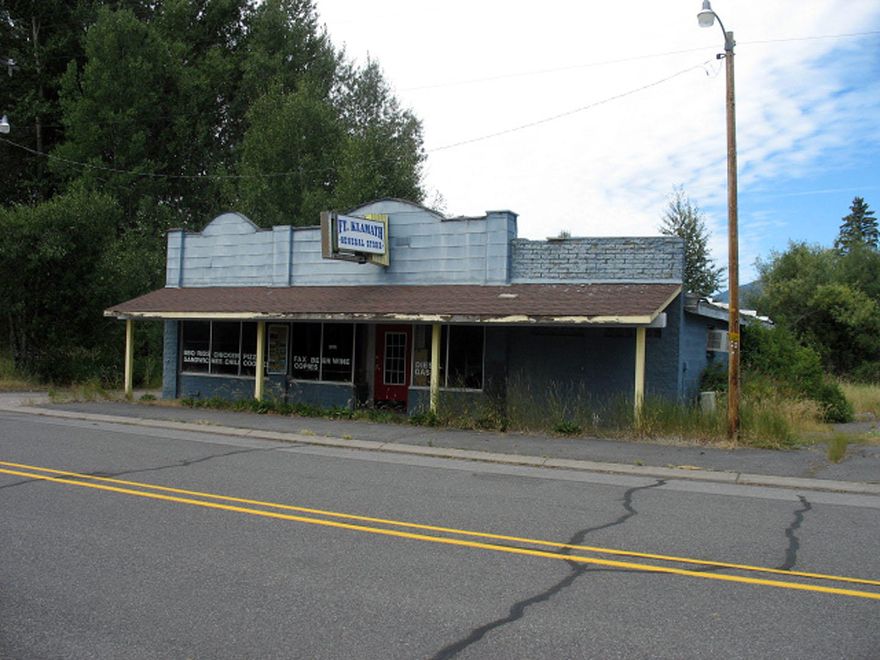 Rare opportunity to buy 3 acres of land (10 parcels), highway frontage, commercial, just outside of Crater Lake National Park where the Lake has approx over 700,000 visitors a year. There is a 1983 2BR/2BA single wide home behind the old building that was at one time a general store. There was also a gas station at one time(according to the seller there was an above ground gas tank, but it was removed)on the property. The property is close to Crater Lake National Park. Several out buildings are on the property. Lots of potential for the this property, total of 10 tax lots with zoning, varing from R5 to commercial. All potential buyer/s to perform their own Due Diligence. Property is been sold in an AS-IS condition. Trailer has been winterized.