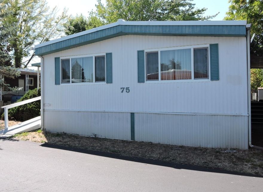 Great investment opportunity, selling as-is, motivated seller. This three-bedroom two full bathroom home has almost 1400 sq. feet of living space and is in the highly desirable and quiet 55+ Candlewood Park. Great park like setting and close to downtown shopping, only 10 minutes from Ashland and the Shakespeare Festival. This home has some upgrades including thermal pane windows, newer roof and heat pump. It has a large covered deck which is wheelchair friendly, large carport and a storage building. All appliances are included.