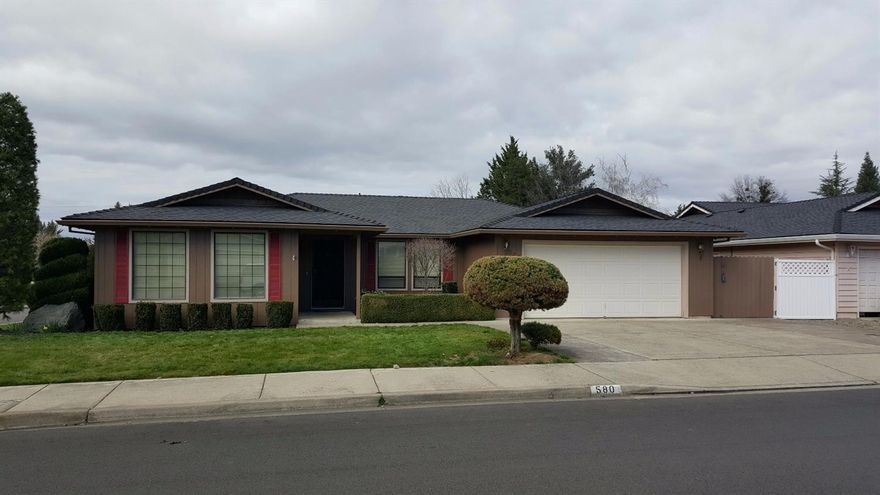 One of my favorite all time floor plans. Formal living and formal dining on each side as you enter, bedrooms and baths to the left and the kitchen and family room with fireplace to the right. The step down living room provides privacy from the hustle and bustle of the kitchen family room that is wide open. The kitchen offers plenty of cupboards and counter space which includes a large island and wall to wall pantry and looks over to the family room's fireplace at the opposite end. All of the bedrooms are large with the keyed master bedroom suite at the end of the hall. It offers a large walk in closet and a big master bath with a walk in shower. The main bath is located across from the 2 other bedrooms and offers a skylight and lots of cupboards for your linen. The inside utility is located close to the bedrooms and offers a sink and a door to the large backyard. If you are looking for a beautiful home close to services and just about everything else, this is the one for you.