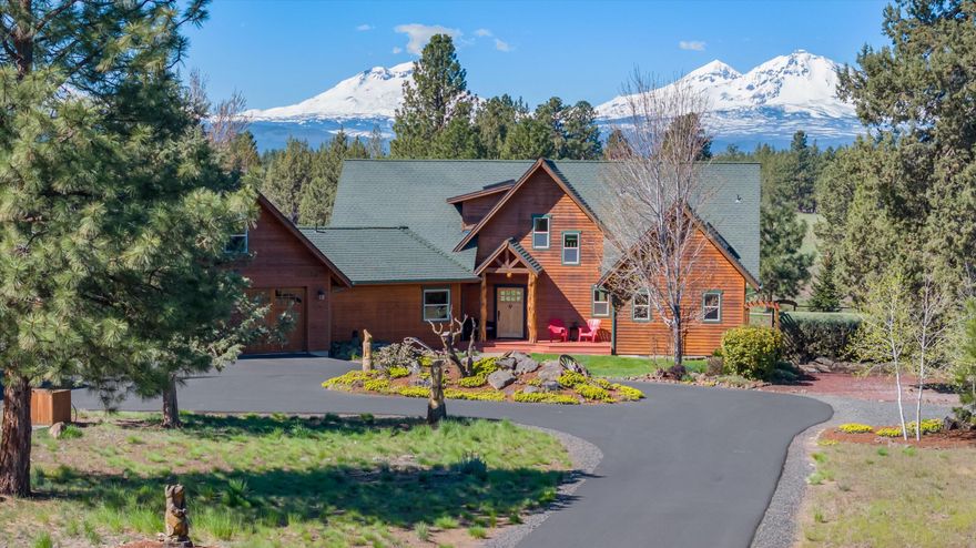 Presenting Alpenglow, with sweeping Cascade Mountain views and an abundance of charm, this gated 19.85 acre lodge style retreat offers sublime peace & privacy. Thoughtful custom home by Sunlight Construction captures panoramic views from nearly every room. Vaulted great room w/ wood burning river rock fireplace is adjacent to chef's kitchen w/bkfst bar & adjoining dining room leading to expansive patio for outdoor entertaining & stargazing. Take respite in luxurious main level mountain view primary suite w/ fireplace, spa style ensuite & access to hot-tub patio. Upstairs loft provides an ideal office nook that leads to two guestrooms w/ cozy reading dormers, full bath & glistening mountain views. Delivering an incomparable living experience w/ attached garage, workshop & game room w/ pool table, property also inc 3-bay shop for RV/Eqpmnt parking. Outdoors is a leisure haven w/ horseshoes, acres of adventure, orchard & English gardens adding to the tranquility of this special property.