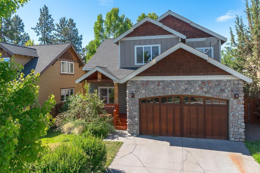 Gorgeous turn key home in a desirable NW Bend neighborhood. Great room floor plan w/ river rock gas fireplace. Spacious kitchen features stainless appliances, granite tiled counters, pantry & breakfast bar. Park like backyard with large decks & mature shade trees. Master suite w/ a large soaking tub, double vanity & walk in closet. Two other bedrooms & utility room upstairs, 4th bedroom is downstairs. Great lighting and skylights throughout. Oversize garage w/tons of storage. Close to river trail & shopping