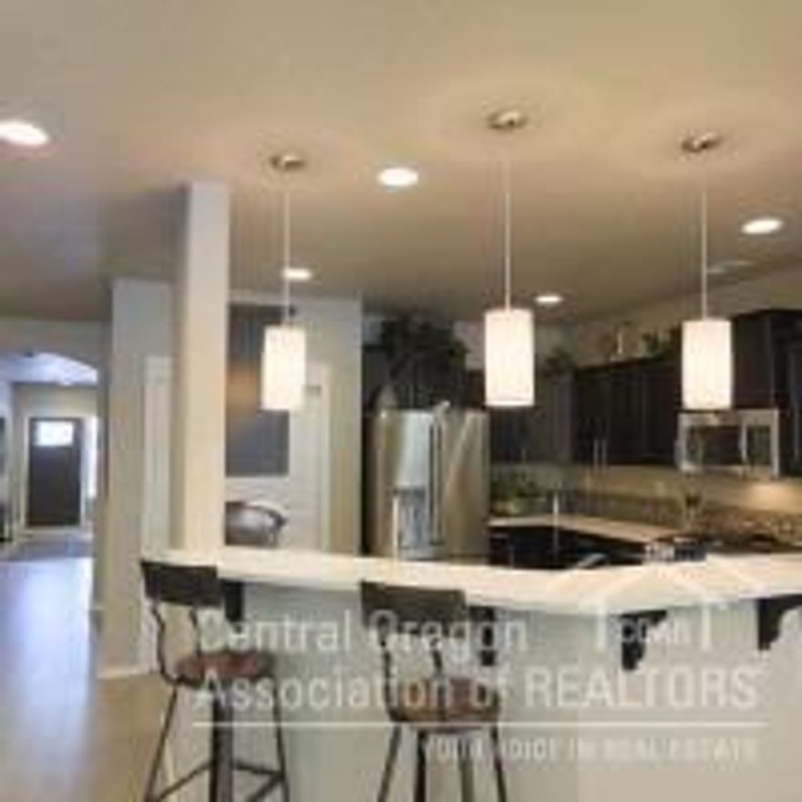 The 1574 square foot Hudson single level home is a a perfect sized home. The open concept kitchen has counter space galore, plenty of cupboard storage and a breakfast bar. The expansive living room and adjoining dining area complete this eating and entertainment space. The private master suite boasts a dual vanity bathroom and an enormous closet with great separation from the other 2 bedrooms. MOVE IN SOON!!!!! 3 CAR GARAGE!!! Pictures not of actual home.