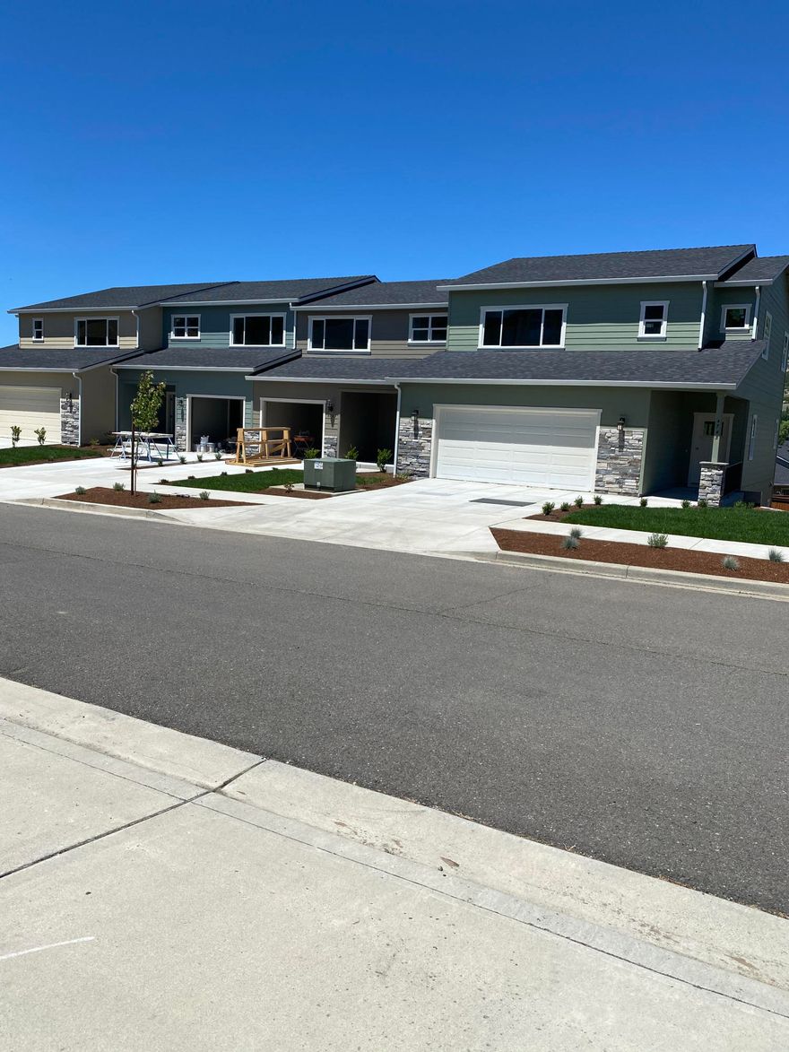 New 4-plex town homes in desirable East Medford with views. Enter the main floor of 4317 Hathaway to an open great rm, dining, kitchen & powder rm. Granite counter tops in the kitchen with a large island, stainless appliances, gas stove & loads of storage. A wall of windows & sliding glass door lead to a large covered deck & views of Roxy Ann peak. Head upstairs to an amazing master suite with views, huge walk-in closet with built -in drawers & organizers. The en-suite bath has a granite double vanity & tiled walk in shower. There is a second bedroom on this level with walk in- closet, full bath. The downstairs level includes a large family room, game or hobby room. The other units are the same top notch construction & similar amenities. At $133.00/sq ft, these units are priced under market for a great investment. 
6% cap rate if owner managed

Building permit numbers 18-02375, 18-0237,18-02376,18-0238

Taxes=Land only