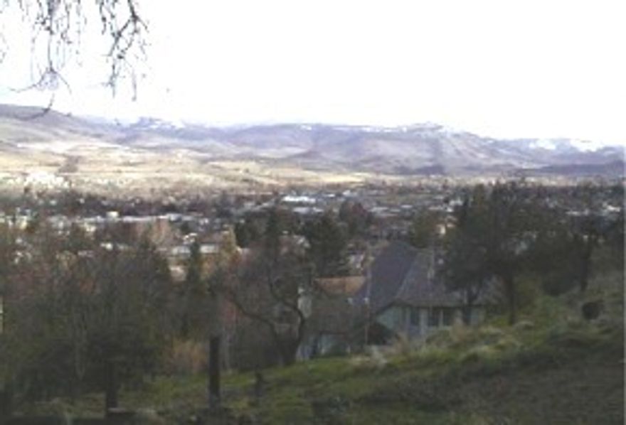 Large 12,000+ square foot, rare Ashland view lot ready for your new home. Rural feeling area with view of city lights and mountains. Briscoe School District.