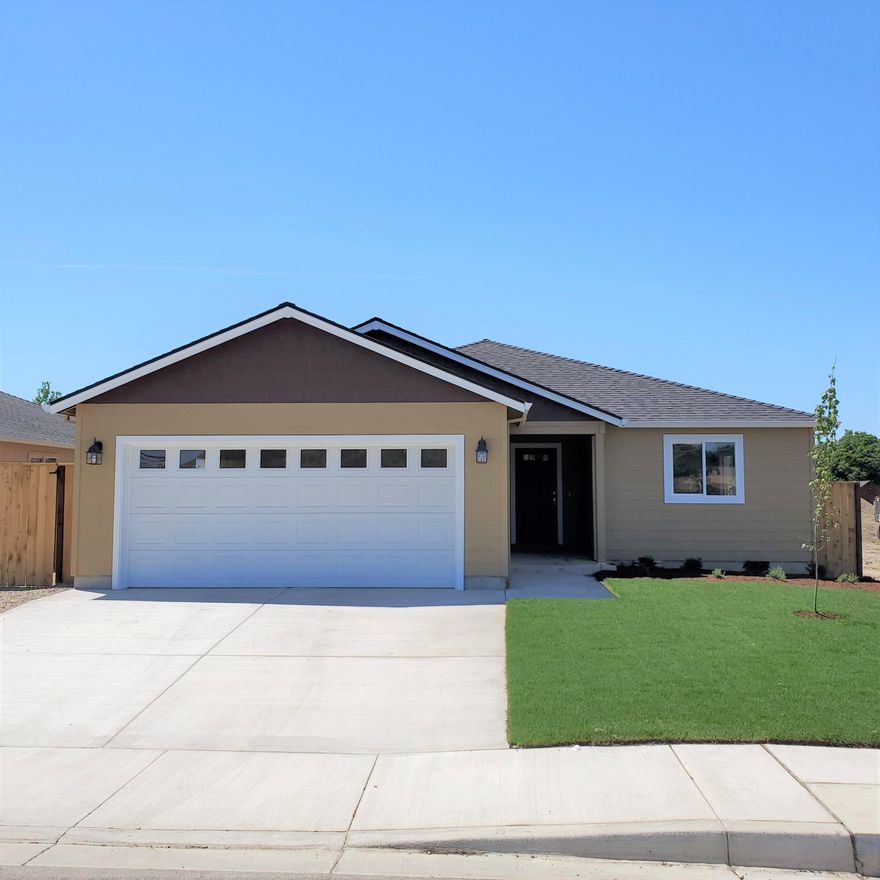 Brand new single-story on cul-de-sac lot built by long standing and reputable Rogue Valley builder!  Vaulted living room.  Kitchen has granite counters, range/oven, microwave hood, dishwasher and pantry storage.  Master suite offers walk-in closet and double sink vanity.  Indoor laundry room.  Covered back patio. Attached 2-car garage with opener.  Landscaping and fencing included.  Certificate of Occupancy issued!