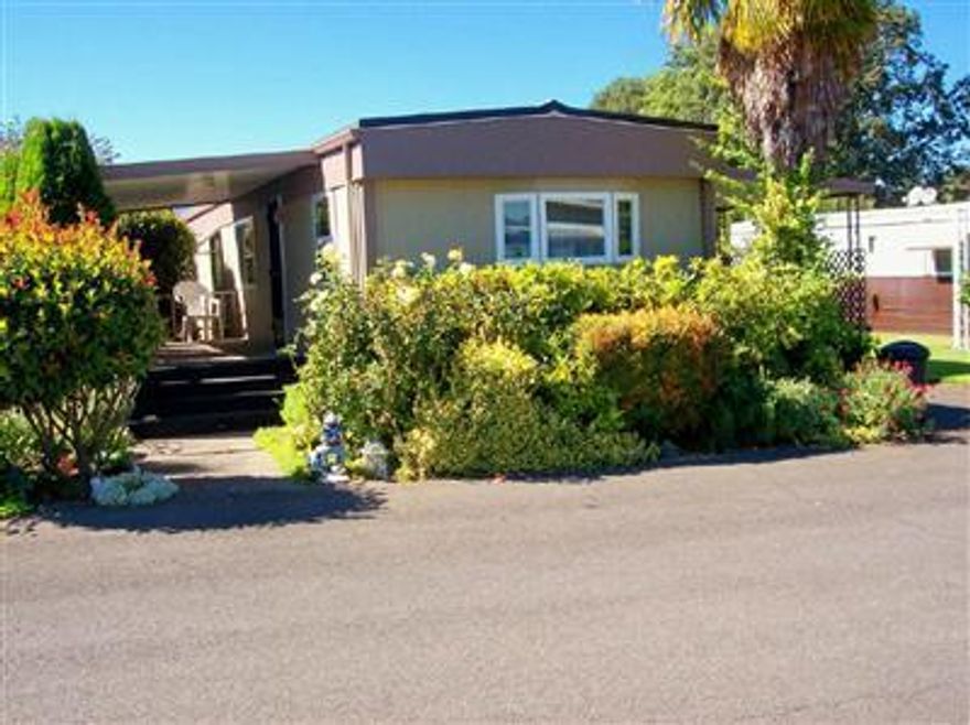 Riviera Best Buy! This 1980 SW has a lot to offer. 2/1 with 784 sf has newer roof coating & paint, carpet has been cleaned & home is clean & well-maintained. All curtains & blinds stay as well as all appliances. Nice kit. w/pantry, deck & storage shed. The extra long driveway/carport can hold 3 cars. Make an offer now!