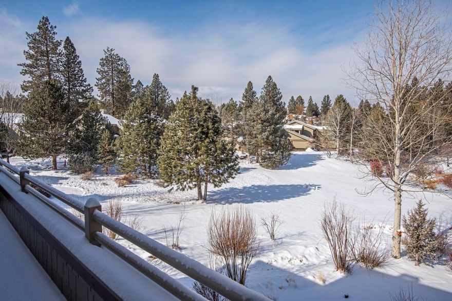 Come home to this incredible Broken Top Painted Ridge townhome with beautiful views of nature and a large pond. Enjoy the sounds of the creek just outside your windows.  This townhome offers great privacy, easy living and low maintenance so that you can enjoy all that Bend has to offer. Enjoy all the natural light through your large windows along with the open floor plan, gracious living room and stacked stone fireplace to keep you cozy during the winter months. You will find the master en-suite on the main level along with a second master en-suite on the lower level. Friends, family and guests will love the additional family room with fridge & wet bar, large guest bedrooms and another full bath with tub. Tall ceilings and large doors to walk out and enjoy your outdoor living spaces and views will certainly impress your guests. Large storage rooms for your extra hobby items and toys. This home has many recently added upgrades for the new owners to enjoy!