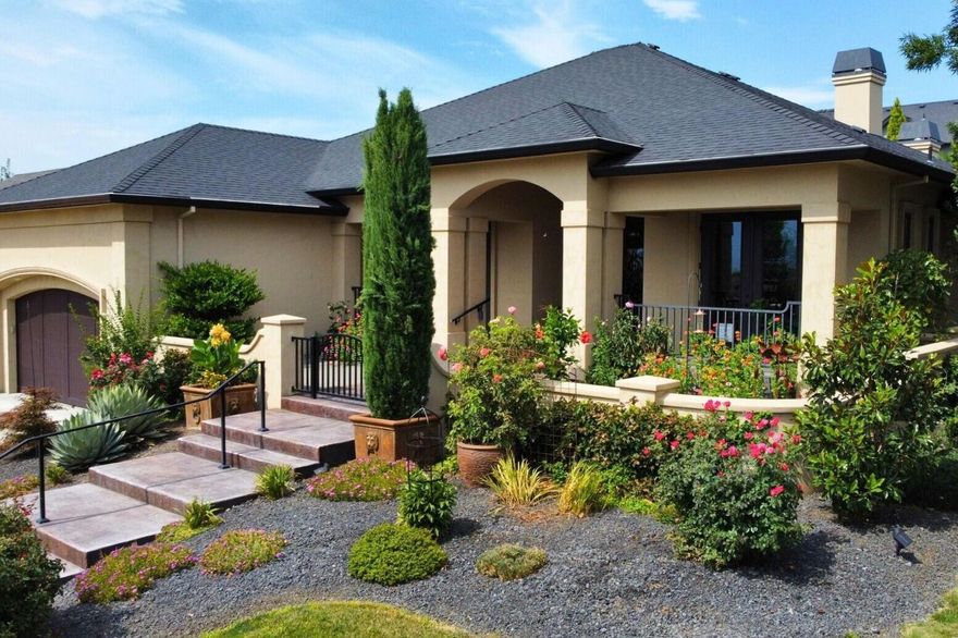 One-of-a-kind Tuscan-style masterpiece in sought-after Summerfield! This ultra-custom home features a split floor plan with 3 bedrooms plus an office and is filled with high-end finishes and thoughtful details throughout. Enjoy beautiful views from the front entry courtyard with stamped concrete and an iron gate. Inside, you'll find high ceilings with exposed beams, Italian paver tile floors, and custom built-in cabinetry in the great room, office, breakfast nook, butler's pantry, and master closet. The chef's kitchen boasts Thermador appliances, double ovens, a built-in refrigerator, granite counters, and walnut butcher block island, The luxurious primary suite offers heated floors in both the bathroom and walk-in closet. Cozy up to gas fireplaces in the great room and covered patio, surrounded by lush landscaping, palm trees, wisteria, artificial turf, and a private pergola with hot tub. Truly a rare gem blending elegance, comfort, and timeless design.