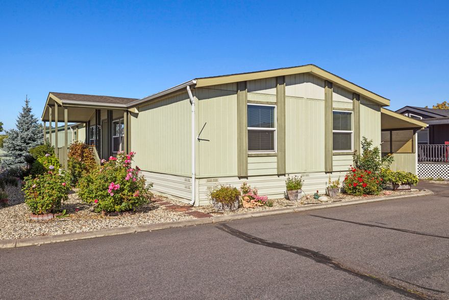 Step inside to find generous square footage, vaulted ceilings, and an open floor plan that feels bright and inviting. The kitchen shines with a large island, granite countertops, updated tile work, and modern finishes, while a dedicated laundry room adds everyday convenience. Outside, enjoy a covered carport, storage shed, and a charming deck framed by flower beds—a wonderful spot to sip your morning coffee or unwind at the end of the day. With recent improvements both inside and out, this home is move-in ready and waiting for its next owner.
Come see why this property stands out as a great opportunity in a vibrant 55+ community!