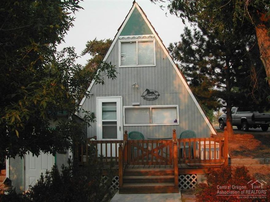 Charming & affordable horse set-up. Two homes allowed. Small A-frame & older mfgd home, mature shade & fruit trees, 5 acres sprinkler irrigated with K-Line system. 1668 sq ft shop with power & cement floor, machine shed, outdoor arena, round pen, pond, pump house for your private well, newer irrigation pump, large circular driveway, and many other features making this property very critter friendly.