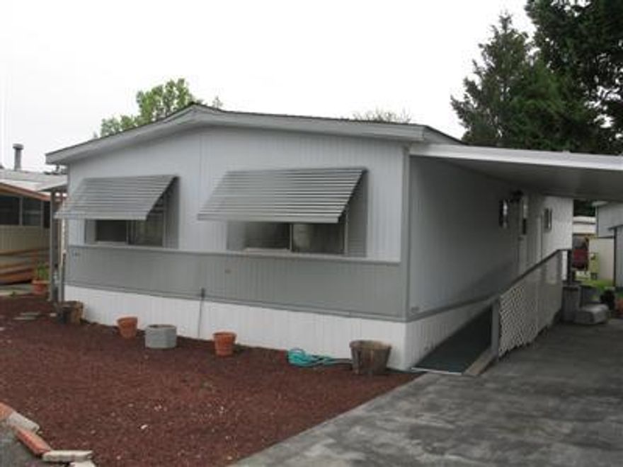 Country Estates (55 +) Mobile Home Park. This is a great place to retire.Bring your smaller pets and walk by the tranquil Rogue River. This 2 bedroom 2 baths Statler double-wide manufactured home is handicap friendly with central heat and air.