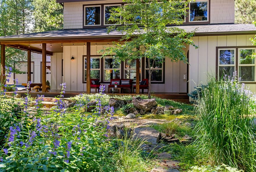 Welcome to your private retreat in the desirable River Forest Acres neighborhood where nature, comfort, & recreation come together. This beautifully updated home offers effortless enjoyment of the Deschutes River perfect for paddleboarding, kayaking, fishing, or peaceful walks along the water and forest trails. Just 23 miles to Mt. Bachelor, and 9 miles to the Sunriver Resort. Inside, the home is warm, inviting, and thoughtfully updated with charming details throughout. The main-level primary suite features its own fireplace and large picture windows that frame serene views of the garden and stream. Upstairs, a spacious loft, additional bedroom, and full bathroom provide flexible space for guests or a quiet home office. The outdoor setting is truly something special, a lush landscaped garden welcomes you with a meandering stream and tranquil pond. A standout feature is the finished detached shop and RV garage, adding an additional 1088 sq ft complete with its own outdoor seating.