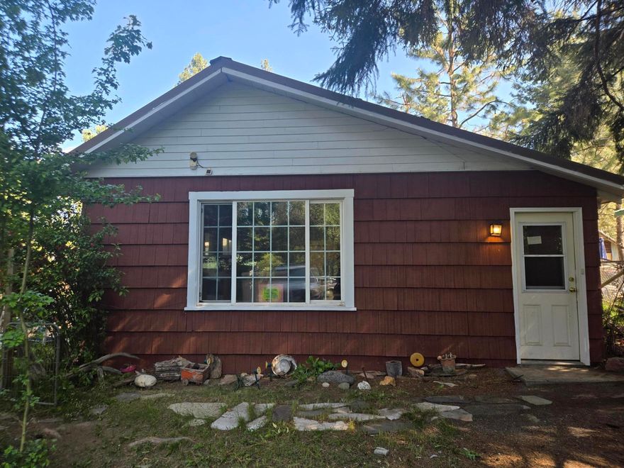 Looking for a rustic feel that's close to town.  Look no further. This spacious, almost 2000 square foot home in Chiloquin is near the Williamson River, Pacific Crest Trail, Crater Lake, Kla-Mo-Ya casino, gas station, schools, restaurants and bars and community center.  This home has 175 square foot unfinished basement, metal roof, freshly painted outside and most of the rooms inside.  Peaceful corner lot on almost a quarter of an acre with lots of trees and nature at your front door.  There is a rec room that could be used as an additional bedroom.  Huge living room-built ins and lots of vintage character throughout the house. This is a must see.  Schedule your showing today. Seller motivated due to health issues.