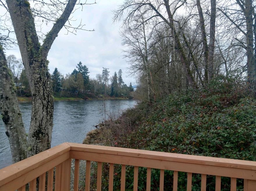 Large double-wide in 55+ Park. Interior refreshed with new vinyl, paint & carpet. Great small shop on cement floor. Park has access to the Rogue River with a new fishing deck.