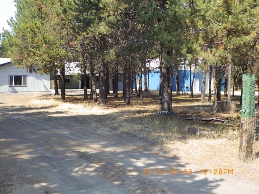 Great location! 2136 SF home with 4 bedrooms,2.5 baths, plus den. Detached 1800 SF shop with work area. Out building, small green house, approx. 1 acre. Backs up to BLM land. Close to Paulina and East Lake, easy access to snowmobiling, horse back riding, hiking etc...Great place if you love the out doors!
