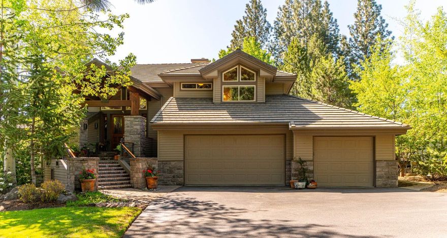 Nestled in a stunning landscape, this Northwest contemporary lodge-style home graces the 12th green of Broken Top Golf Course. The residence blends rustic charm and modern elegance. Crafted with detail and surrounded by mature landscaping, the exterior features natural stone accents and expansive windows inviting the surroundings indoors. Inside, find refined luxury, warmth, and tranquility, with exposed timber beams and rich textures. Earthy tones complement the landscape, creating a seamless indoor-outdoor connection. The great room features a cathedral ceiling and floor-to-ceiling windows. The gourmet kitchen offers top-of-the-line appliances, custom cabinetry, and granite countertops. The master suite is a sanctuary with a new spa-like bath, soaking tub, dual vanities, and walk-in shower. French doors open to a private patio and hot tub. Outside, the deck invites al fresco dining with golf course views and mature landscaping.