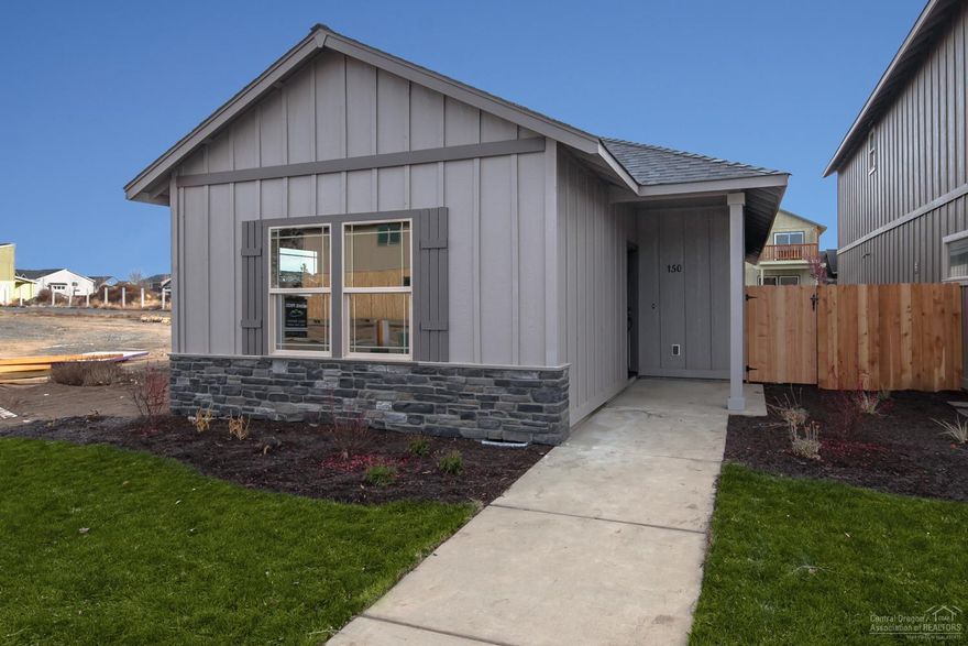 Holly floor plan in one of Redmond's premier neighborhoods. 2 bedroom, 2 bath, 1,012 sf of living space. Lg great room open to Kitchen w/island & eating bar. Knotty Pine cabinets, Quartz slab counter tops, all Stainless Energy Star appliances. Gas forced air w/high efficiency furnace & A/C. Single car garage. Front & Back Landscaping w/ auto sprinklers, fully fenced. 11 other floor plans available - See model home @ 3095 NW Alder Place, Thu-Mon 12-5pm.