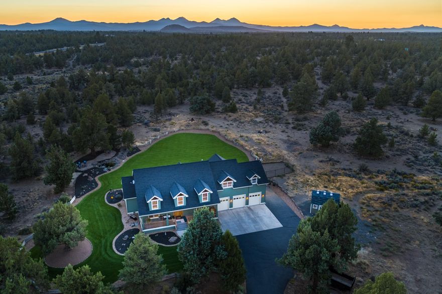 Enjoy Cascade peak views from this park like 16+ acre setting just 5 minutes from St Charles and fun new eastside amenities! Numerous outdoor living spaces take advantage of the privacy and landscaping. The 3800+ square foot farmhouse style home offers a master on the main level, an office/den, tons of storage, 3 car garage, cinema room, and a magnificent pub/game room with balcony overlooking the Cascade peaks! There is also a flex room which could easily be converted to a 4th bedroom. This home has been lovingly cared for and upgraded with over $100K in improvements over the last four years – including HVAC system w/ 2 heat pumps and 2 furnaces, Tuff Shed w/220 amp power, kitchen appliances, sealed garage floor, and LED lighting throughout. Relish the best of Bend, living on acreage with privacy while being only 5 minutes from groceries, restaurants, shopping, entertainment and medical! Call your Realtor and check out this opportunity today!