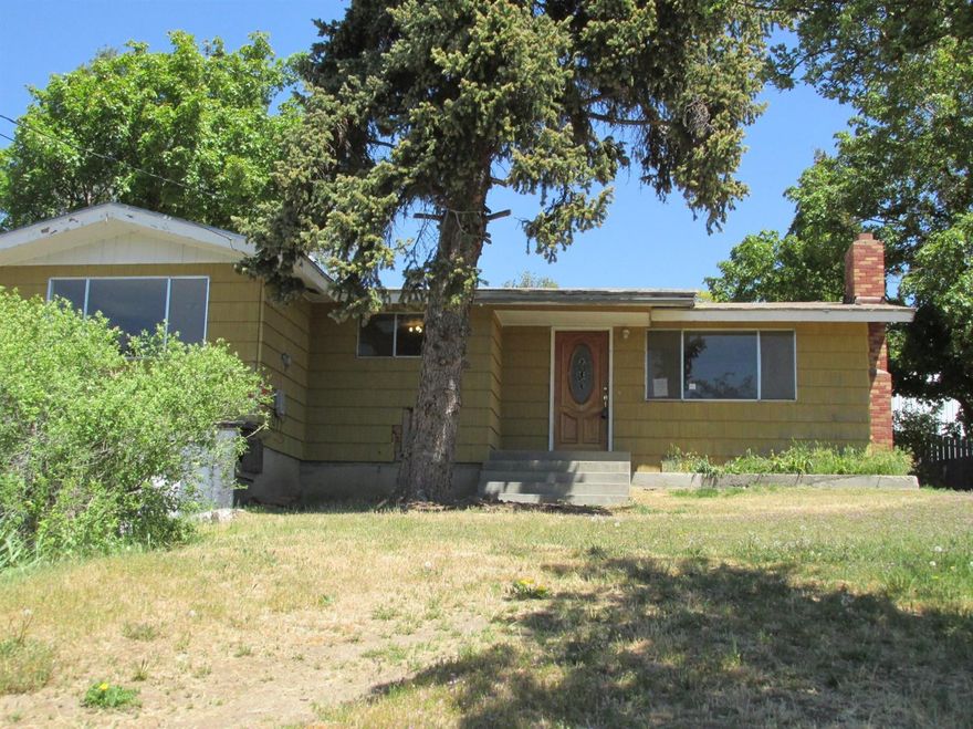 Cute 3 bedroom home on large .23 acre lot. It has hardwood floors nice sized living room with fireplace. Large laundry room has extra space that would be great for an office.