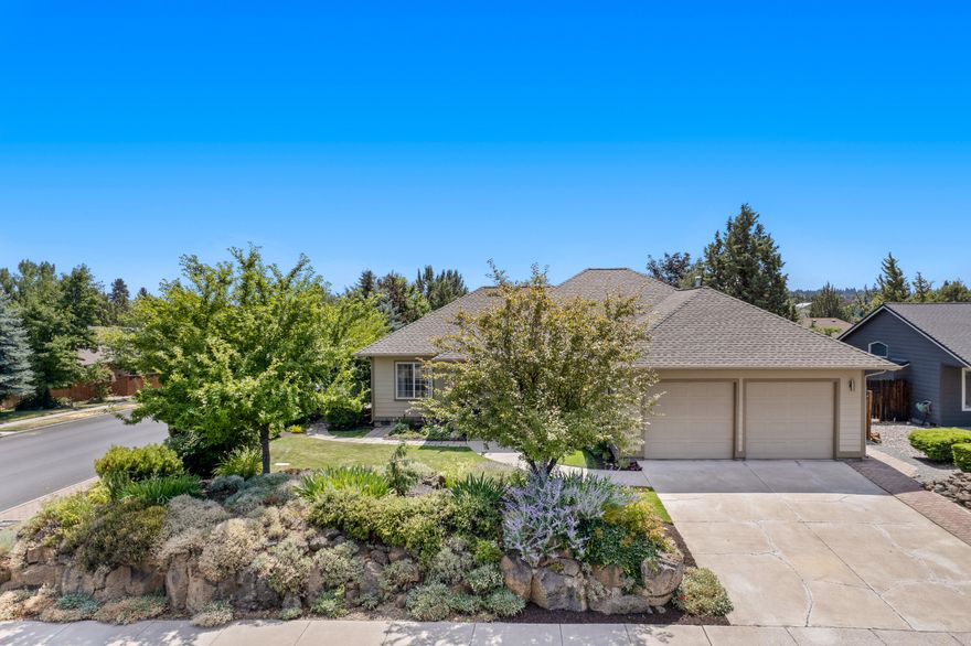 Located on a large .20 acre corner lot, this single-level home is a gem with sophisticated interior finishes and fully-fenced, private backyard set-up for relaxation and entertaining. The curb appeal captures your attention upon arrival with native landscaping, blooming flowers, and welcoming front porch. Inside is light, bright and airy with big windows, 9ft ceilings, custom cabinets, granite countertops, and four generously sized bedrooms-- one of which would function wonderfully as a home office. All bedrooms are generous in size. The spacious primary suite has private access onto the expansive back deck overlooking grape vines and flowers. Additional highlights making this home stand apart--new roof, new gutters, new energy efficient furnace w/ air scrubber, and new central A/C --all within past two years. This NE location is close proximity to schools, shopping, hospital, and popular Pine Nursery Park - with trails, off leash dog park, Frisbee golf, and Pickle Ball courts.