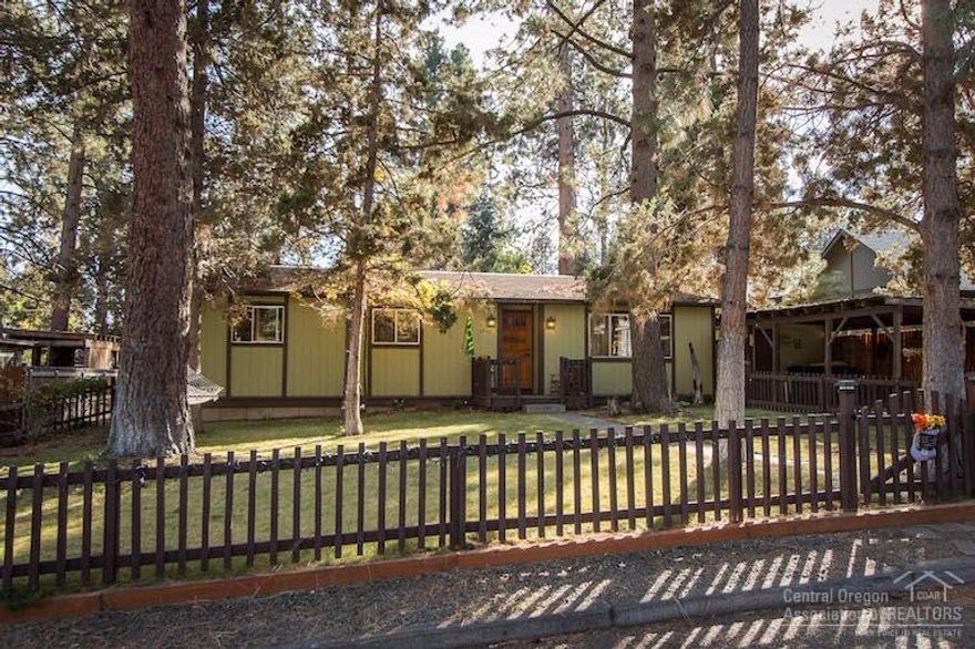 In the heart of Bend's vibrant west side! Loads of character in this single level 3 bedroom, 1 bath home. Set on 1 1/2 lots. Spacious fenced yard is a gardener's dream. 3 raised garden beds, new gardening shed and plenty of room to expand. Street access to car port with additional boat/RV/trailer parking from the alley. A very special property! Call today for your private viewing.