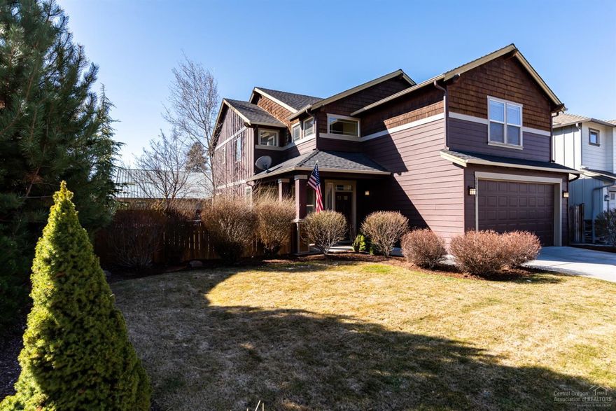 Prime location in Northeast Bend! This open floor plan features 4 bedrooms/2.5 baths, hardwood flooring throughout kitchen and dining area, and a light-filled Great Room with custom stone gas fireplace. Large laundry room is conveniently located off the entrance from the spacious two car garage. Upstairs, the 4th bedroom can easily serve as a bonus room or playroom. Master bath offers a large walk-in closet and upgraded jetted tub. The private fenced backyard has an added water feature and plenty of room to roam! Close to your neighborhood coffee shop, market, pizzeria and more. Excellent value and a must see!