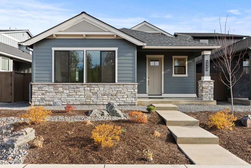 Discover the Aspen Townhome on Lot 70 in Collier, a premier community by award-winning Pahlisch Homes. This stunning townhome, inspired by the popular Everett model, is only attached at the garage for added privacy. Step inside to a welcoming foyer leading to an open living space. The main floor features a serene primary bedroom retreat, open concept great room and a chef's delight kitchen including JennAir appliances with a large walk-in pantry. Upstairs, enjoy a spacious loft perfect for a second living area or home office, two bedrooms and a bath. Surrounded by Ponderosa Pines in NW Bend, Collier offers easy access to shopping, dining, and miles of trails, with Shevlin Park just minutes away and a trail leading directly into Discovery Park right from the community.