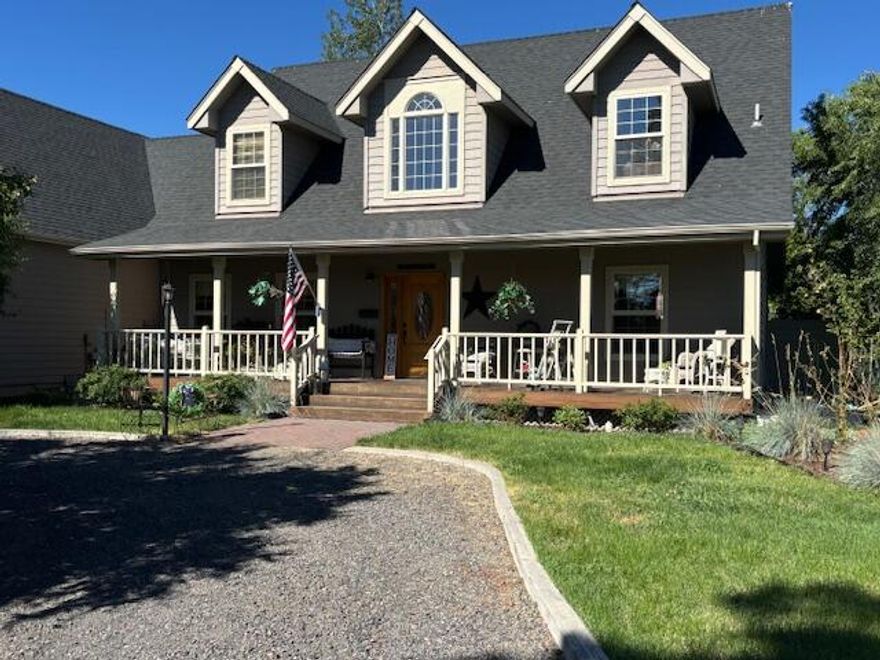 Sit and watch the sunsets over looking the Cascade Mountains on your covered deck. Set up your BBQ outdoor kitchen on the concert patio. This beautiful home has all this to offer along with primary bedroom on the main floor, living room nice working kitchen with large island and pantry. Formal dinning that is great for those gatherings. 2 bedrooms and a bath along with a large bonus room on the second story are few of the interior features. 
3 car garage, 1000 +square foot shop with a lean to so you have plenty of room to store your toys. Property is fenced and has 1 acre of COID irrigation water.