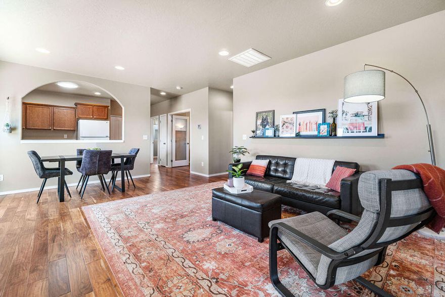 Live in the heart of NE Bend in this charming 3-bedroom home. Enjoy natural light that floods through the windows creating a warm and inviting living space. The large open-concept living room is the perfect spot for relaxing or gathering with friends and family. Just off the living room is a private, low-maintenance backyard that is a wonderful spot for those who want to enjoy the outdoors without the added responsibility of constant upkeep. The spacious primary suite has ample room for a king-size bed and also includes a walk-in closet and en-suite bathroom with dual vanities. Two additional bedrooms (one that would make a fantastic home office or playroom) provide plenty of living space for everyone. Living in Bend means you acquire lots of toys, and the garage at this home is extra deep to accommodate all your gear.  This home is perfect for first-time homebuyers, downsizers, investors or anyone looking for a cozy and comfortable space to call their own in Bend!