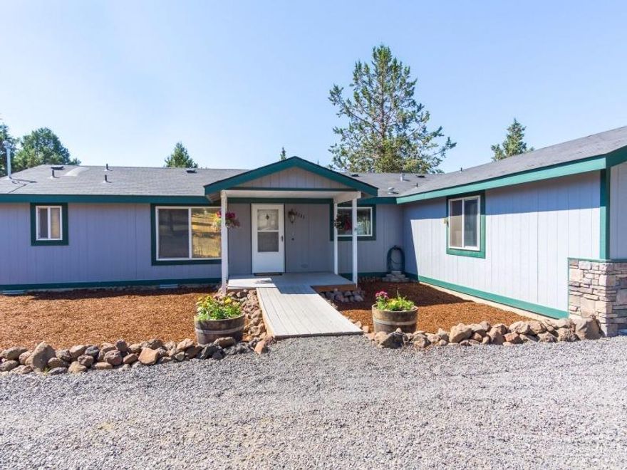 Darling country home on an acre in Crooked River Ranch! Big bonus that could easily be home office, nursery or 4th bedroom. Generous master en-suite with slider to back yard, walk-in closet, 2 additional bedrooms with walk-in closets. High ceilings, skylights,kiitchen with island. Good sized laundry room with built-ins, laundry sink, washer and dryer. Big 2 car garage is attached. Loads of room to park cars, trucks, toys, RVs, trailers and more! Small pasture area has hot fence and a small barn.