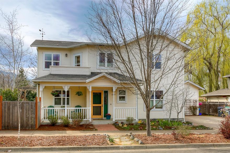 Visit this contemporary craftsman style home located in one of Ashland's most desirable neighborhoods- near Garfield Park, Farmer's Market and easy access to bike path. On a quiet street bordering a beautiful neighborhood open space with a creek, this 1790 sf 4 bedroom 2.5 bath home won't last long. A welcoming covered front porch invites you into a home with lovely details- alcove sitting area, wood floors, arched entry ways, upstairs balcony, south facing windows in dining and living room that provide incredible natural light and views of the creek and opens space. Sunny master bedroom with walk-in closet provides a relaxing oasis. Two additional bedrooms and a full bath are upstairs while downstairs bedroom can be used as a den or family room. Step outside into the park-like yard with apple, plum and fig trees, a grapevine covered arbor and a year-round creek. Large shed with loft can be used for storage or re-purposed as a quiet getaway or artist studio.