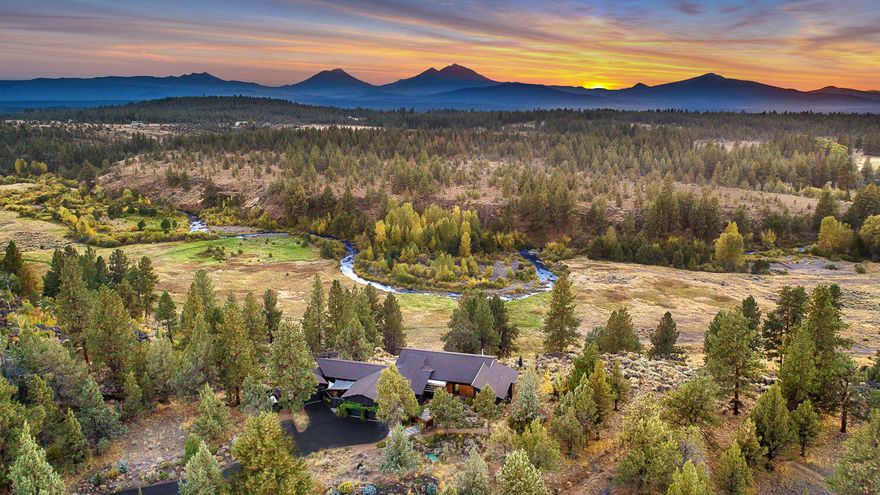 Stunning setting on canyon rim with huge, permanently unobstructed, mountain/meadow/creek views. Superior quality construction/design incorporates natural elements throughout this rare-to-find modern home. Interior features: Single-level living; Open floor plan; High ceilings; Abundant light/views; Polished concrete floors with radiant heat; Gourmet kitchen with custom built-ins, high-end appliances, eating bar; Assorted, creative nooks throughout; Large/efficient mudroom/laundry/workspace; Primary bedroom separate from other living spaces with walk-in closet & shower, soaking tub; Detached office with private access; Exterior features: Fantastic outdoor living with huge wrap-around deck; Multiple sitting areas, 2 firepits, salt water jacuzzi; Front courtyards for privacy and road separation; Native landscape designed for xeriscape sustainability. Attached 2-car garage and separate single car garage for ''extras'' or workout space; Views, views, views overlooking Willow Springs Preserve