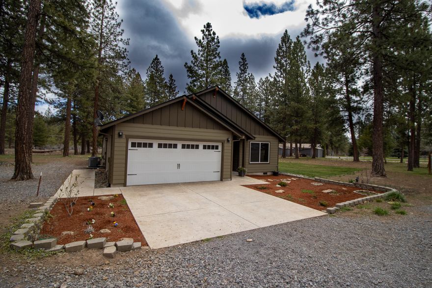 Amazing opportunity to settle down in one of the area's most beautiful neighborhoods. Offering 2 bedrooms and 2 full bathrooms. This custom built home sits on 4.44 acres, is fully fenced, and has a ready to go barn with two stalls for horses or other animals. Covered patio, RV dump, extra power for another shop or barn, gas hook up for BBQ, in ground sprinklers, and insulated garage are just a few more extras you will get with this gem of a property. Whether you like riding, wheeling, or hiking, the close proximity to public lands and wilderness for recreation is one more amenity you will get with this immaculate property!