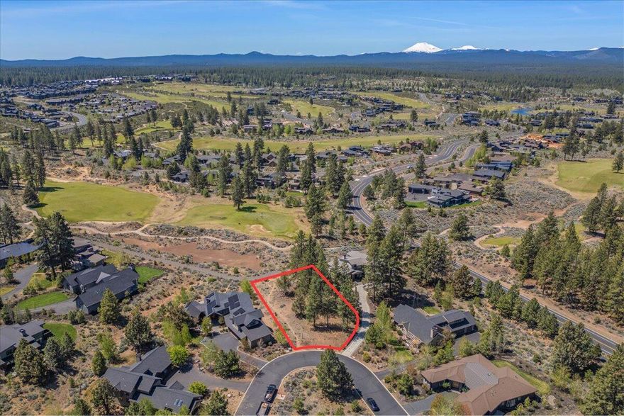 Experience breathtaking views from this .44-acre flat lot located in a private, gated cul-de-sac in the Glen neighborhood of Tetherow, showcasing stunning mountain and golf vistas. The seller is including completed home plans, renderings, full engineering and landscaping plans, a golf membership transfer, interior design elements, and builder selection options. The plans include a 4,129 sq. ft. home, featuring a floating staircase, 15-foot ceilings and 1,183 sq. ft. of covered patio. Enjoy easy access to Phil's Trail XC Mountain bike trail and the Deschutes National Forest, convenient proximity to world class resort style living including Tetherow's Scottish links-style golf course, a year-round heated pool, clubhouse, fitness facilities, a members-only pool, restaurants, and a playground.