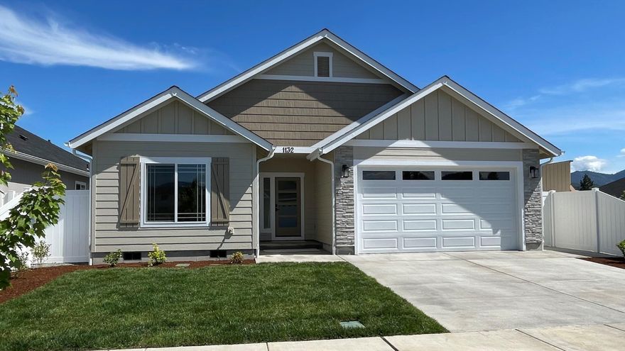 BRAND NEW HOME in lovely Blackberry Glen with access to semi-private, wildland park across the street! Home features 9 foot ceilings, white cabinets and granite counters throughout. The breakfast bar kitchen with pantry will feature white upper cabinets and stained alder lowers with undermount sink and stainless steel appliances & a skylight to brighten the room. Primary bedroom and bath with dual undermount sinks and large walk-in closet.  Upgraded, tankless water heater.  Spacious, rear covered patio and backyard.  Premium, no maintenance, vinyl fencing.  Country location close to Schroeder Park on the mighty and majestic Rogue River, with rural feel, yet with city services and District 7 schools. A no-marijuana grow zone, Blackberry Glen is a designed, Pocket Neighborhood-style development for enhanced living enjoyment and sense of community. CALL FOR A LOOK INSIDE TODAY!