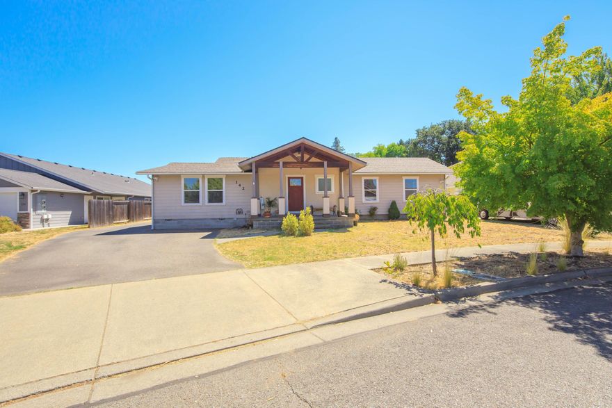 This home has many nice upgrades and is full of charm. Open floor plan with a slider to the backyard patio from the living room. The dream kitchen is spacious with granite counters, stainless appliances (included), island, pantry and adjoining Dining room area. The laundry room has a door leading to the side yard convenient for accessing the detached 2 car garage. Primary bedroom features double closets and an en-suite bathroom with a walk in shower. The living area, bedrooms and kitchen have laminate flooring, tile in bathrooms and laundry room. Both front and back covered patios are custom stamped concrete. The detached garage has room for a workshop, fenced back yard w/firepit, R.V. parking w/hookups. You won't want to miss this one.