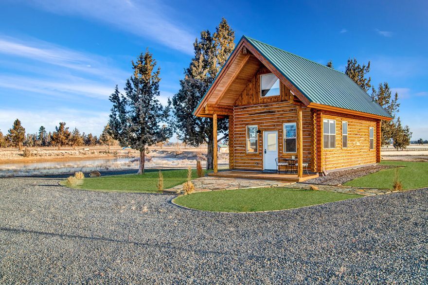 Picturesque log cabin with modern comforts located on 72 acres of serene farmland with pressurized water delivery irrigation in the vibrant community of Sisters. Positioned with massive views of the towering Cascades, Tumalo Farms is perfect for one seeking a private getaway enveloped in 360 degrees of majestic landscape with a charming pond. Grow your own crop or lease to a custom farmer. Sisters is a charming town reminiscent of the Old West and just 20 minutes from Bend, hosting a mix of restaurants and shopping; and home to Mt Bachelor's world-class skiing and mountain biking. This parcel, once part of the equestrian training grounds of Tumalo Farms, is rich in history and has a unique story to share. Whether you are looking for a unique hobby farm with a storybook cabin to escape the crowds or are searching for the ideal spot to build your dream home, Tumalo Farms won't disappoint. Isn't this the year to get away, escape the crowds and return to nature?