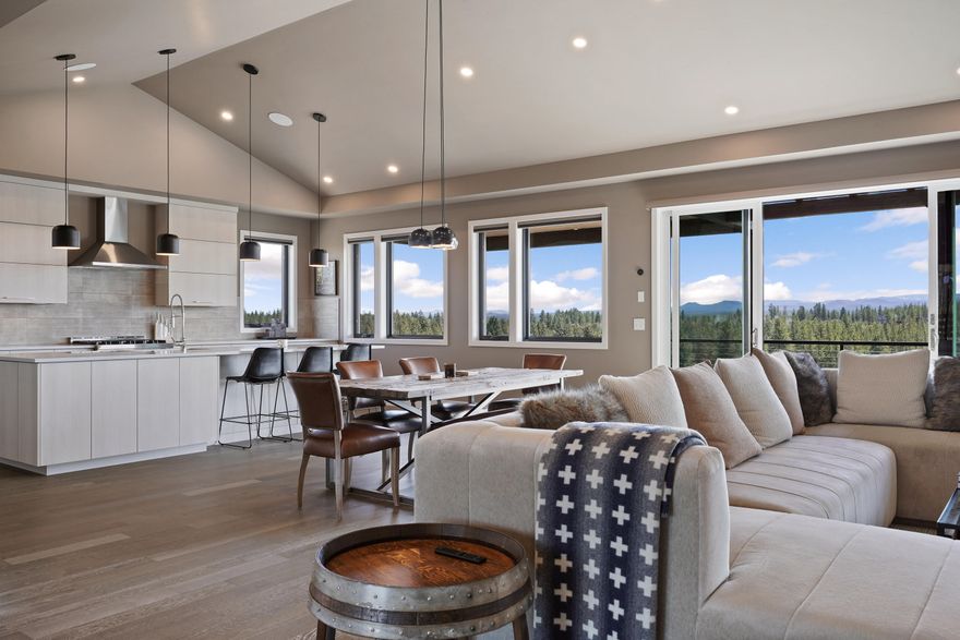 Discover this beautiful single-story home in the sought-after Trailhead neighborhood of Tetherow, perfect for those seeking easy lock-and-leave living. Enjoy expansive butte views from this BendTrend-built gem, featuring 4 bedrooms plus an office, a spacious mud/laundry room, and an open vaulted floor plan designed for effortless living. Located across from the Tetherow clubhouse and pool, this home offers luxury finishes including quartz surfaces, wood and tile floors, fully-tiled showers, radiant floor heating, custom closets, Jenn-Air Pro appliances, AC, and a Sonos system. The private walk-out deck is ideal for watching Bend's stunning weather patterns. With a spacious 2-car garage and direct access to the neighborhood trailhead, this home is just minutes from Mount Bachelor's skiing and outdoor activities. A perfect blend of luxury, comfort, and convenience!