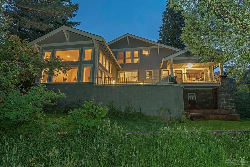 Classic downtown Bend bungalow with stunning Deschutes River frontage on one of downtown Bend's most coveted locations! Never leave your home while you relax or entertain on the expansive deck with established landscaping & privacy on the river. A stone's throw from 1st Street Rapids, Pioneer Park, the Deschutes river trail, downtown shops & restaurants. Spacious .37 acre zoned RM downtown lot allows for a multi-family conversion with plenty of space to spare. Addition designed by Ven Sexton in 1992, built by Kirby Nagelhout Construction.