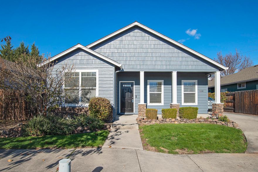 This beautiful flawless home features 3 bedrooms and 2 full bathrooms.  Vaulted ceilings in the living room.  Kitchen is gorgeous with Corian counters, beautiful back splash and pantry.  There is even a breakfast bar.  Dining area located off of the kitchen.  Two good size bedrooms at the front of the home.  In the back of the home is a huge master complete with walk in closet and double vanity.  RV parking and hookups.  Detached garage/shop and a patio over looking the green grass completes this home!