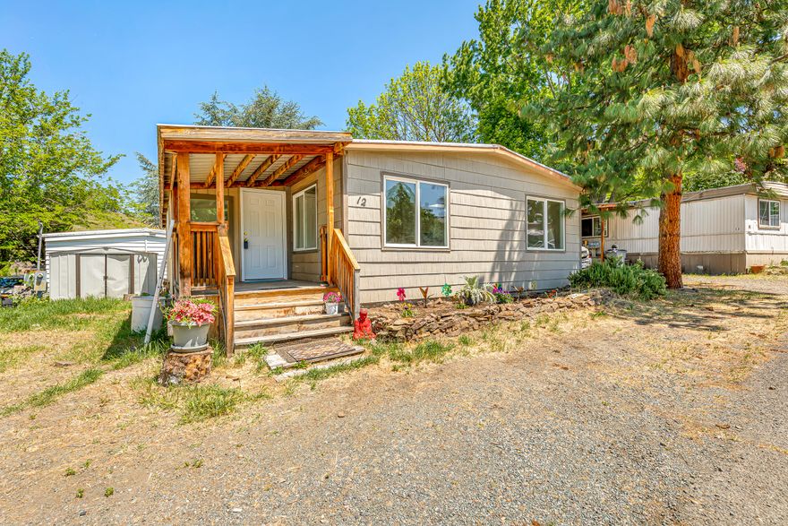 Refreshed everything! New laminate flooring, cabinets, counters, paint. There are 4 skylights offering this beautiful home a light and bright open concept which leads to laundry/storage room and a dual vanity half bath and two bedrooms. Primary is complimented by a beautiful custom tiled shower and room to expand if desired.
Two bonus rooms with bamboo flooring make this home feel much more expansive! 
Property is plumbed for both gas range or gas fireplace.
Backyard is also hot tub ready.