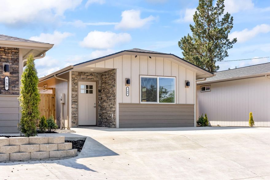 Exceptional Value - Brand New 2-Bedroom, 2-Bath Home w/great finishes. Now is your chance to own a beautifully designed home at a fraction of the typical price. This 1,050 sq. ft. residence showcases quality craftsmanship, modern layout & a host of upgrades-making it an unbeatable opportunity for both first-time buyers & savvy investors. Step inside to a bright, open-concept living space that connects the kitchen, dining & living areas—ideal for everyday comfort or entertaining guests. The kitchen features quartz countertops, stainless steel appliances & comes fully equipped with a refrigerator, range, microwave, washer & dryer. The fenced backyard adds privacy & functionality, perfect for pets, gatherings, or gardening. Looking for a multi-generational solution or investment potential? Two additional brand-new homes—offering similar finishes & layouts—are available right next door.  Don't miss the rare chance to purchase side-by-side properties! Opportunities like this are rare.