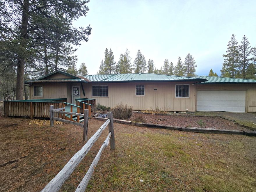 Discover comfort and convenience in this single-level ranch set on nearly an acre just minutes from La Pine State Park. This 3-bedroom, 2-bath, 1,542 sq ft home offers a bright, open floor plan with excellent separation between the primary suite and guest bedrooms. The comfortable kitchen flows into the living and dining areas, perfect for gatherings. Enjoy the outdoors year-round from the covered back deck overlooking the private, treed yard. A 2-car attached garage provides storage and parking, while the large lot offers space for gardening, hobbies, or simply relaxing. Ideally located to enjoy Central Oregon's recreation, trails, and beauty.