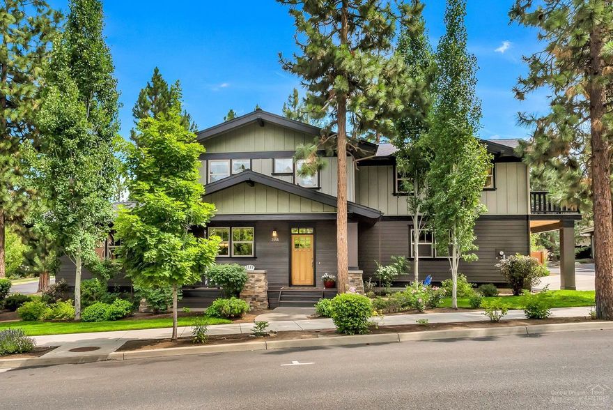 Impeccable craftsman home on a large corner lot less than a block away from Northwest Crossing's Compass Park. The open floor plan features a spacious kitchen and great room with vaulted ceilings surrounded by windows and a large deck off the dining area perfect for entertaining. Hardwood floors, solid natural wood doors, custom cabinets, woodwork & trim details throughout the home. Enjoy a ground level office/guest bedroom as well as the master suite complete with a full tile shower and dual vanity. Upstairs features a loft/flex space, 2 additional bedrooms and a bathroom. A 600sf, 1 bedroom ADU over the garage w/exterior & interior access for use as a separate apartment or part of the home boasts a full kitchen, cozy gas fireplace and a spacious deck looking towards the park. Featuring an oversized 2-car garage for all your storage needs, this home will surely fit the bill for living the Bend lifestyle.