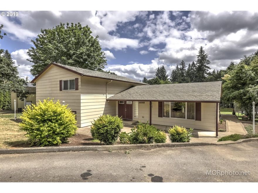 1 acre property w/backyard entertainment setting w/firepit, covered patio, 24 x 36 shop w/220amp & secure loft above w/large swing door, RV parking & RV electric Hookup. Home is split level, separate entrance, multi generational, w/Master suite w/walk in, large basement below and 2nd Master w/half bath. Public water district, on septic.