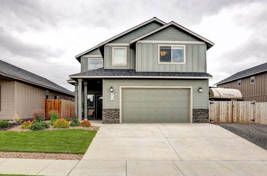 This better than new home built by Dunlap Fine Homes has all the upgrades and is the definition of turnkey. This home is 2509 sqft, with 4 bedrooms and 2.5 bathrooms, with a wide tandem triple garage deep enough for a large SUV. This home also has side yard access big enough to park your RV with hookups. The home has all the upgrades with Energy Star air conditioning and forced air heating, Energy Star windows, laminate flooring, quartz counter tops with stainless steel appliances with a gas range. The front and backyard is fully landscaped with automatic sprinklers as well as a nice covered patio area so you can enjoy the nice quiet and newly established neighborhood.