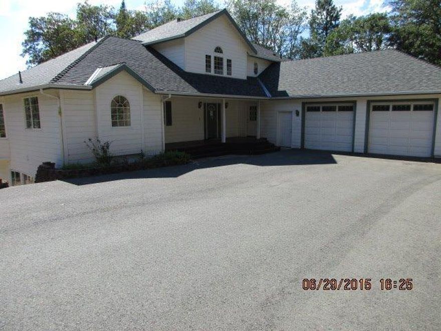 Large custom built home in good condition ready for new owner. Located on over five acres in a beautiful rural area. Three bedrooms and 2 full bathrooms on main level, private master suite on the upper level with sitting area. Two bedroom, family room with wet bar and rec room in the daylight basement. Would be great two family/in-law set-up. Beautiful kitchen with breakfast bar and dining area plus there is a formal dining room. Large deck area to enjoy the great outdoors, pasture area plus a barn. The acreage is slightly sloping and nicely treed plus paved driveway makes this a wonderful property.See attachment for PAS requirements and WFHM offer submittal information in the MLS document section.