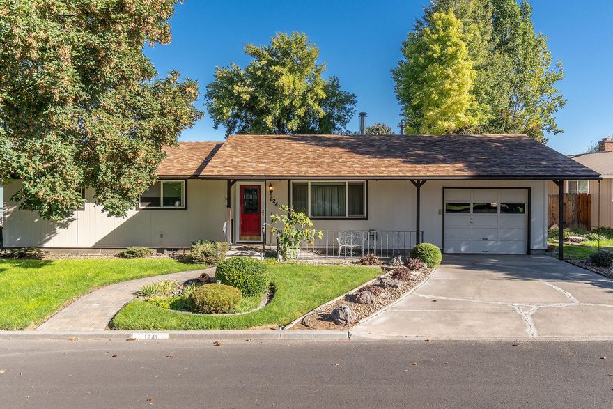 Move In Ready! Single-Level Home with Spacious Backyard & RV Parking! Welcome to this well-maintained and landscaped, 3-bedroom, 2-bath home located in Hidden Springs on Knowledge Street—just minutes from schools, shopping, & medical facilities. Quality construction w/ mostly updated flooring & Corian counters in kitchen, this home offers both comfort and convenience. Enjoy cozy evenings by the wood stove or stay perfectly climate-controlled year-round w/ a gas furnace & central AC Unit. The expansive master suite is a true retreat, featuring a lg master bath w/ beautifully tiled walk-in shower, generous walk-in closet & sky light for natural lighting. Step outside to a large fenced backyard with a garden area, covered pergola with electric awning, and storage shed. The property includes an irrigation well, city water & sewer, w/ alley access providing ample space to park your RVs or recreational toys. Most all furnishings negotiable. This home checks all the boxes—come see today!